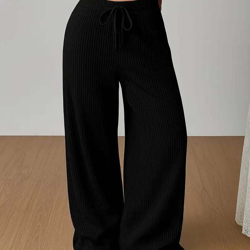 [COMPRÁ 2 Y LLEVÁ 4] Pantalón de Mujer de Tiro Alto en Tela Acanalada con Elastano + Neceser Organizador de Regalo